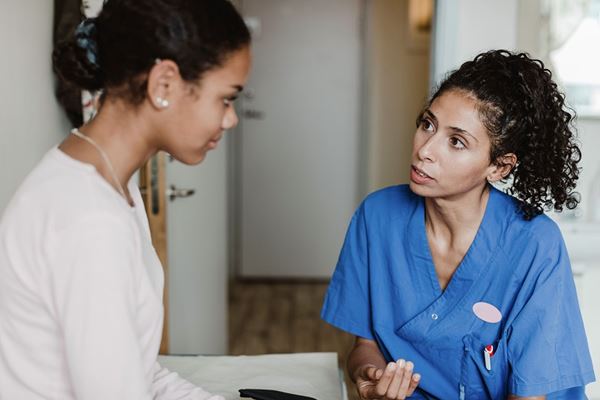 Patient and doctor talking