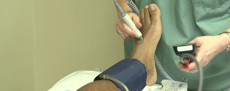 patient receiving PAD therapy on leg